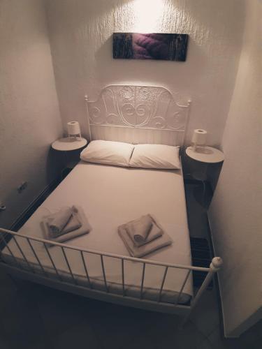 Postel nebo postele na pokoji v ubytování Apartments Leonarda