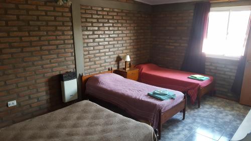 A bed or beds in a room at Santa isabel