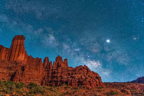 a starry night with the milky way over the desert at Rustic Inn in Moab