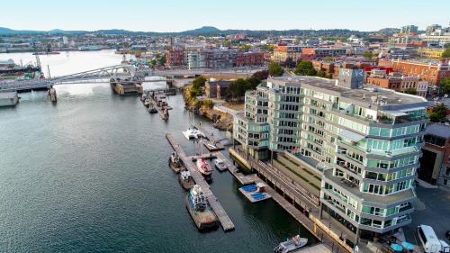an aerial view of a building next to a river at Victoria Regent Waterfront Hotel & Suites in Victoria