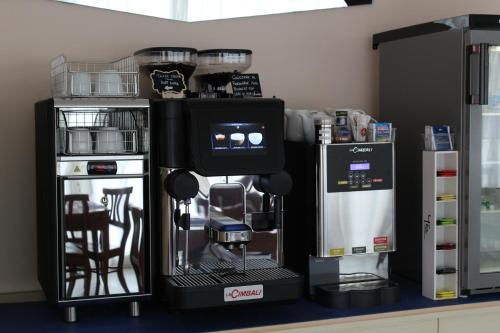 Una cocina o zona de cocina en Hotel Plazza