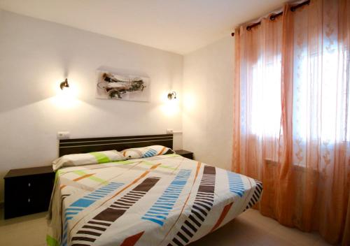 Postel nebo postele na pokoji v ubytování Almadrava FU