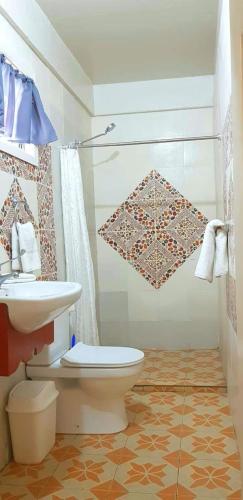 Phòng tắm tại Le Aura Inn