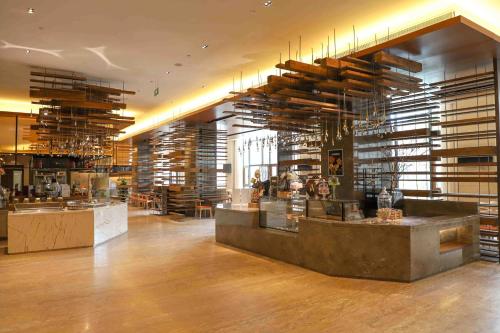 a large room with a large amount of books at Pullman Changbaishan Resort in Fusong