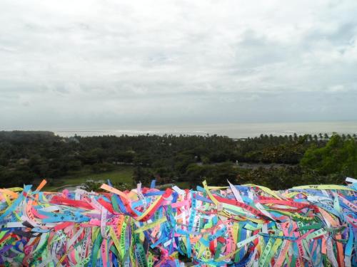 a pile of colorful streamers on a hill at Art Hotel Aos Sinos Dos Anjos in Arraial d'Ajuda
