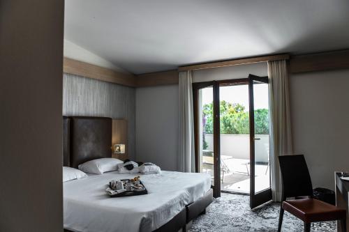 Un pat sau paturi într-o cameră la Hotel Fontermosa