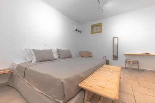 Ένα ή περισσότερα κρεβάτια σε δωμάτιο στο Ventu Paros Villa