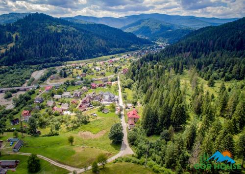 an aerial view of a small town in the mountains at GORHouse Hotel in Yaremche