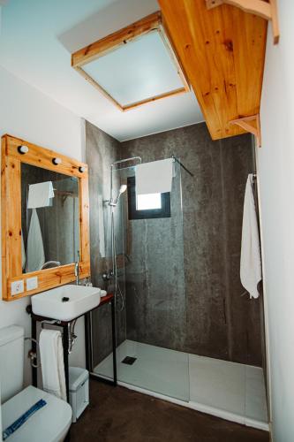 a bathroom with a shower and a sink at Apartamentos Punta Elena Beach in Corralejo