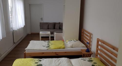 Postel nebo postele na pokoji v ubytování Ein Zuhause auf Zeit