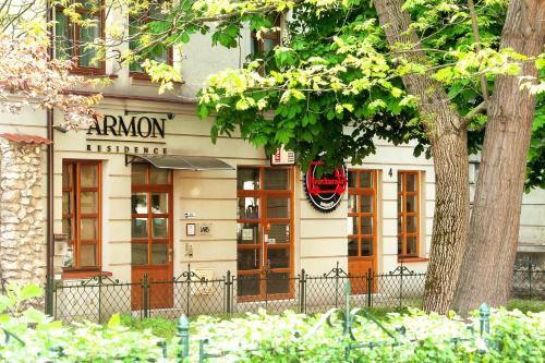 a building with a sign that reads armor hotel at Armon Residence in Krakow