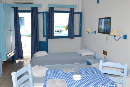 Postel nebo postele na pokoji v ubytování Galeana Beach Hotel