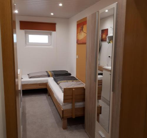 Postel nebo postele na pokoji v ubytování Ferienwohnung Weigert