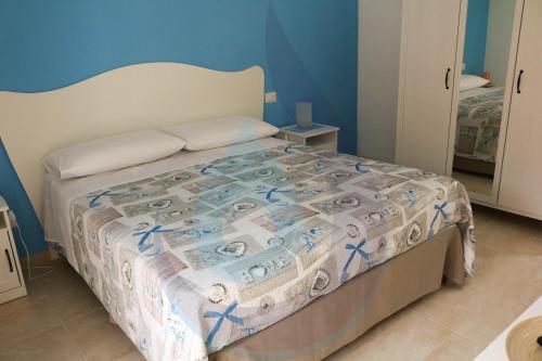 Ένα ή περισσότερα κρεβάτια σε δωμάτιο στο Acqua e Sale Avola