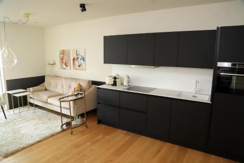 Kuchyň nebo kuchyňský kout v ubytování Das Stadthouse