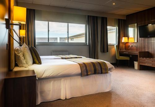 Hotel Ambassadeurにあるベッド