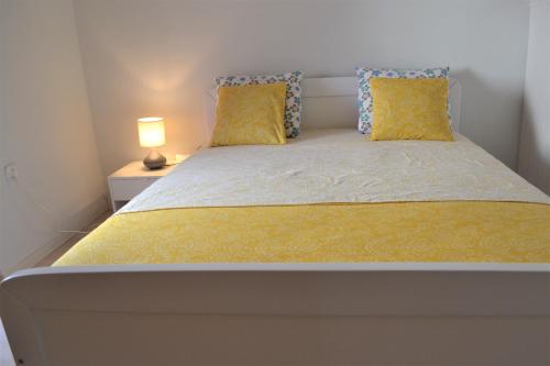 Postel nebo postele na pokoji v ubytování Apartment Osman
