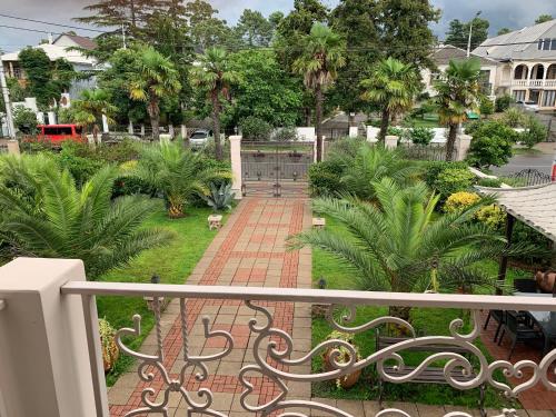 a view of a walkway from a balcony at Kobuleti VILLA SKAZOCNI DVORIK VIP in K'obulet'i
