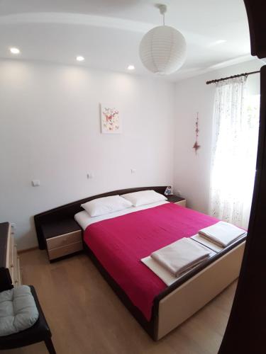 Un pat sau paturi într-o cameră la Apartment Butterfly Split - for rest and relaxation