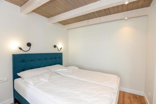 Postel nebo postele na pokoji v ubytování Loft 1973