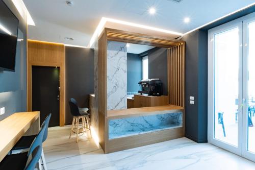 Postel nebo postele na pokoji v ubytování Concept Terrace Hotel
