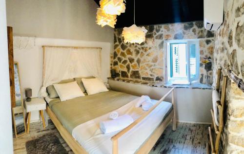 Postel nebo postele na pokoji v ubytování Peasant´s Palace