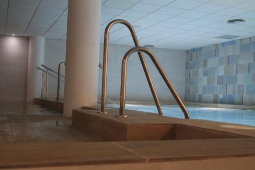 Bazén v ubytování Advise Hotels Reina nebo v jeho okolí