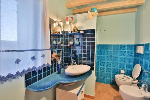 Ванна кімната в Madonie Park Gates - Casa in C.Da Donalegge