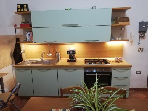 Η κουζίνα ή μικρή κουζίνα στο Guglielmo room's B&B