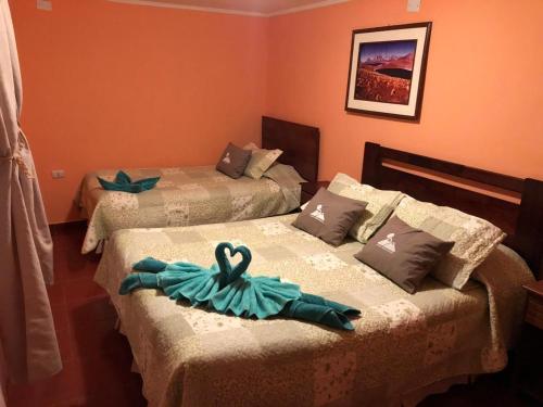 Cama o camas de una habitación en Casa San Marcos 663