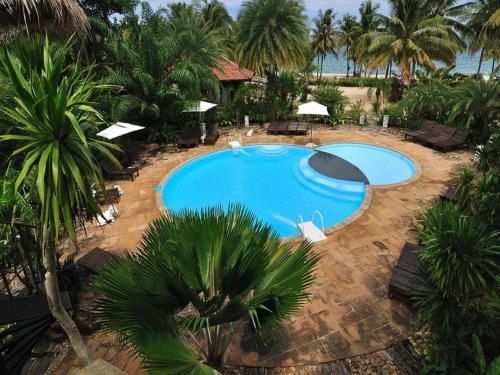 an overhead view of a swimming pool at a resort at Rachavadee Bankrut Resort in Ban Krut