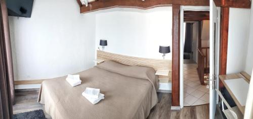 Postel nebo postele na pokoji v ubytování L'Escale chambres privées chez l'habitant JFDL