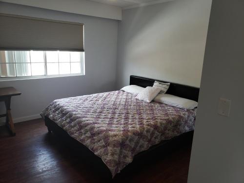 Voodi või voodid majutusasutuse Swan Boutique Apartment toas