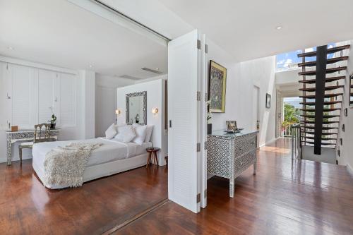 Ένα ή περισσότερα κρεβάτια σε δωμάτιο στο Villa M