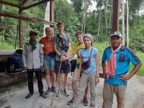 a group of young people posing for a picture at Tribal Village Homestay & Trekking in Banlung