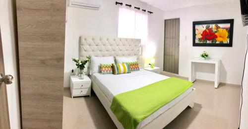Ліжко або ліжка в номері Hotel Platinum Barranquilla