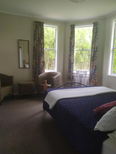 Katil atau katil-katil dalam bilik di Lancewood Lodge