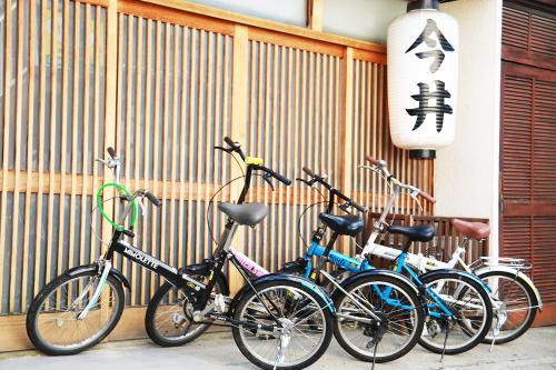 a group of bikes parked next to a building at Nara Imai House in Nara