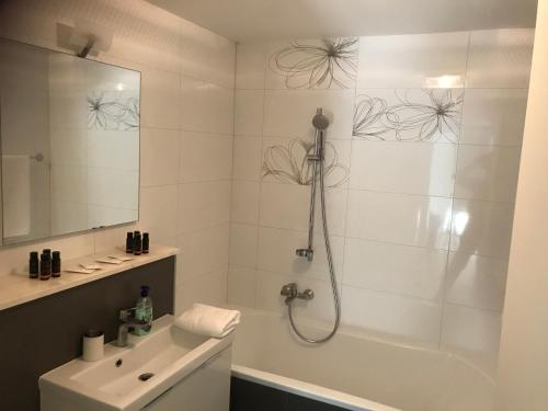 a bathroom with a shower and a sink at Blue Water Apartment in Korčula