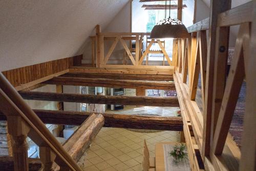 an overhead view of a wooden staircase in a house at Erlendi Kodumajutus in Pärnu