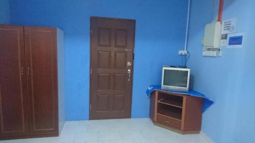 Μια τηλεόραση ή/και κέντρο ψυχαγωγίας στο Homestay Roomstay Muar Srizahrani