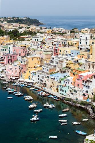 an aerial view of a harbor with boats in the water at San Michele in Procida