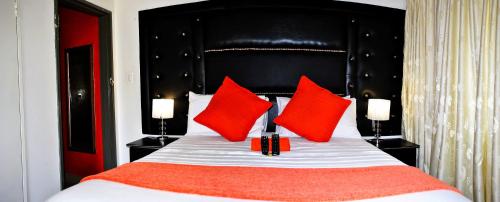 Lapologa B&B Phalaborwaにあるベッド
