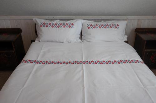 Katil atau katil-katil dalam bilik di Cabana Mosneagului