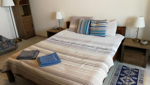 Postel nebo postele na pokoji v ubytování House Radu & Nata of Westeros