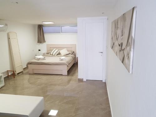 Krevet ili kreveti u jedinici u okviru objekta Eleni apartment Eilat