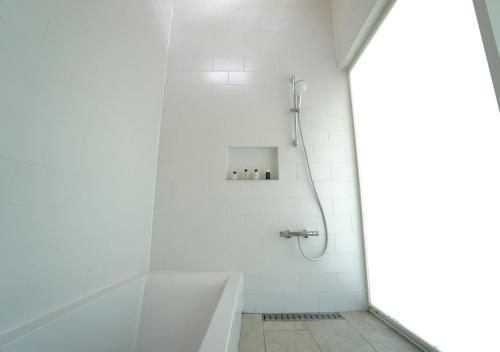 Ванная комната в Miru Amami