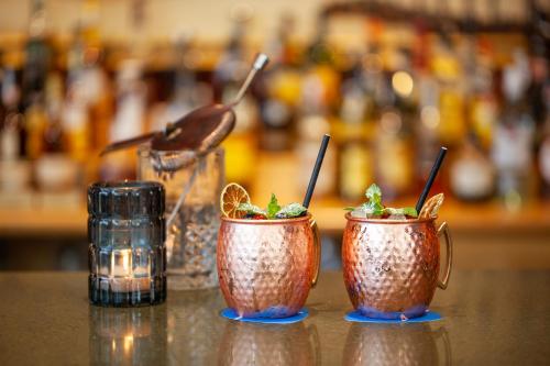 a group of three cups sitting on a table at Grupotel Playa de Palma Suites & Spa in Playa de Palma