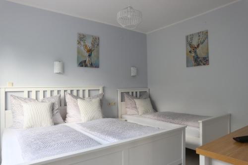 A bed or beds in a room at Apartments Obdach