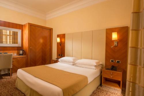 Cama ou camas em um quarto em Suite Opera Rooms